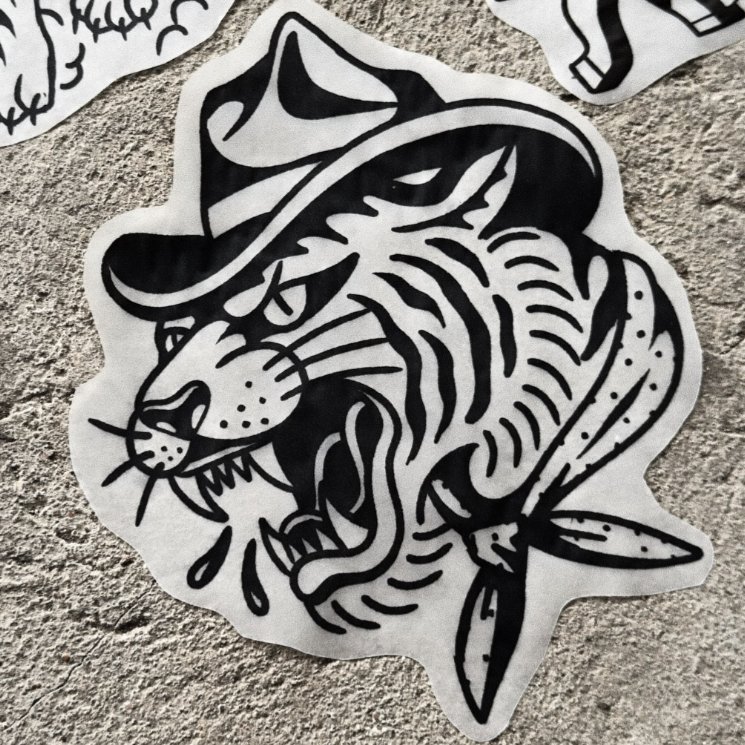 Cowboy tiger — blackwork flash tattoo by Nick Kozlov