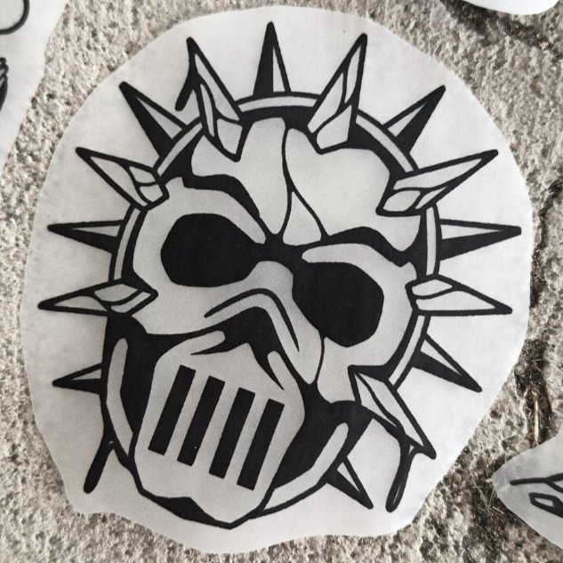 Metal head — blackwork flash tattoo by Nick Kozlov